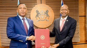 President Duma Gideon Boko and SADC Executive Secretary Elias M. Magosi after signing the finance and development agreements in Gaborone.