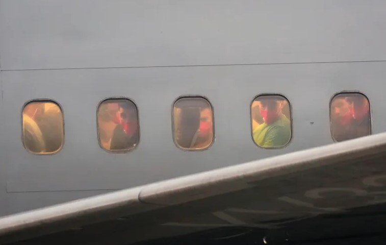Migrants deported last year by the United States to El Salvador under the Trump administration's immigration crackdown arrive at Simon Bolivar International Airport, in Maiquetia, Venezuela, July 18, 2025 [File Ariana Cubillos/AP]