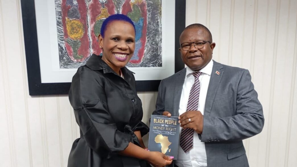Honourable Minister of Commerce, Industry and Trade, Manqoba Khumalo with award-winning author Colisile Tfwala