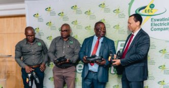 EEC Managing Director Ernest Sipho Mkhonta, MOTRACO General Manager Aderito Sousa, Minister of Education and Training Owen Nxumalo, Members of Parliament and school representatives pose with some of the 1,200 pairs of shoes donated to schools along the MOTRACO 400kV transmission line during the handover ceremony held at the EEC Learning and Conference Centre in Manzini on April 10, 2026. Photo: Supplied