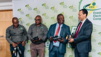 EEC Managing Director Ernest Sipho Mkhonta, MOTRACO General Manager Aderito Sousa, Minister of Education and Training Owen Nxumalo, Members of Parliament and school representatives pose with some of the 1,200 pairs of shoes donated to schools along the MOTRACO 400kV transmission line during the handover ceremony held at the EEC Learning and Conference Centre in Manzini on April 10, 2026. Photo: Supplied