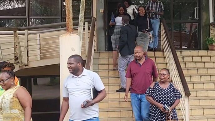 Public sector union delegates walk out of the Ministry of Public Service following the Joint Negotiations Forum meeting held on Monday, April 14, 2026, where the notching dispute between civil servants and the government was deliberated. Photo: Screengrab