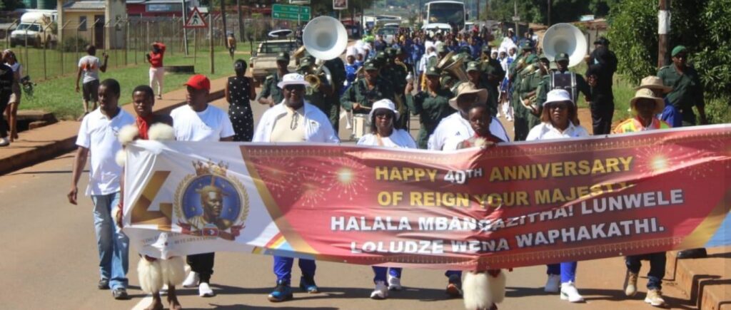 Community members, officials and performers fill the streets of Ezulwini during a roadshow led by the Ministry of Home Affairs and Ezulwini Municipality in honour of His Majesty King Mswati III's 40 years on the Throne and 58th birthday celebrations. | Photo: Supplied