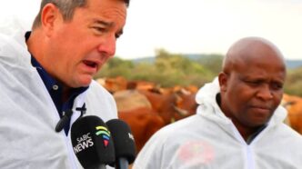 South African Minister of Agriculture John Steenhuisen addresses farmers, veterinary officials and community leaders during a joint foot-and-mouth disease vaccination and awareness drive along the Trans Kalahari Corridor at Swartkopfontein
