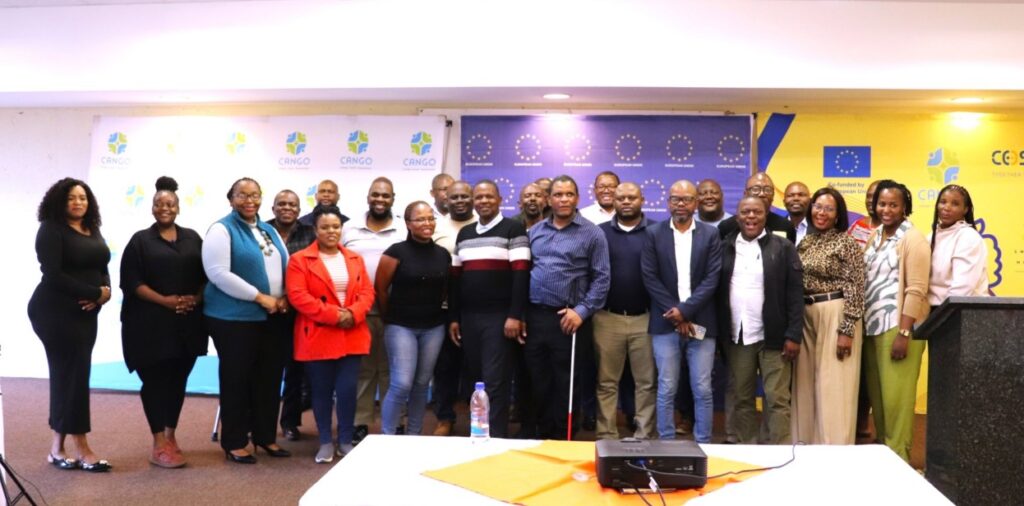 NGO directors and facilitators pose for a group photo during the Corporate Governance Workshop for NGO Directors held at Maguga