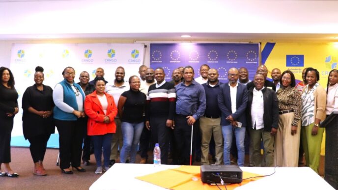 NGO directors and facilitators pose for a group photo during the Corporate Governance Workshop for NGO Directors held at Maguga