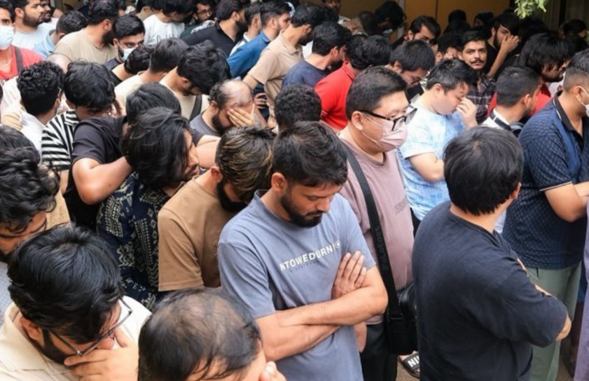 Some of the 231 foreign nationals detained during Uganda's crackdown on illegal immigrants and undocumented businesses in Kampala. (Photo: X/@ntvuganda)