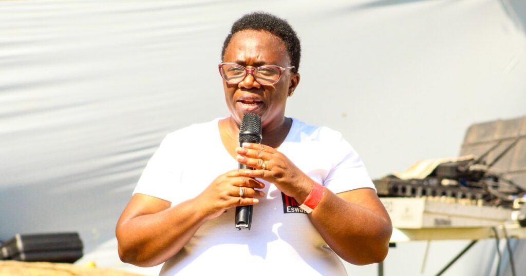 Autism Eswatini Executive Director Tryphinah A.W. Mvubu addresses participants at the Autism Challenge Hiking event