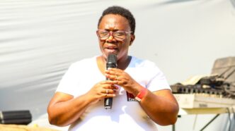 Autism Eswatini Executive Director Tryphinah A.W. Mvubu addresses participants at the Autism Challenge Hiking event