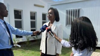 Newly elected Mozambican Bar Association President Thera Tobias Dai speaks to the media