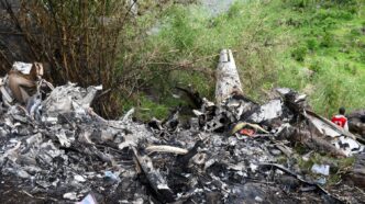 A member of the South Sudan Red Cross walks at the wreckage of a Cessna 208 Caravan operated by CityLink Aviation, that lost communication and crashed while flying from Yei to Juba International Airport, in Juba, South Sudan April 27, 2026. REUTERS/Samir Bol