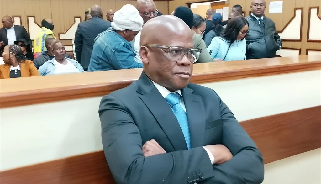 Mpumalanga taxi boss Joe "Ferrari" Sibanyoni leaves the Delmas Magistrate's Court on Thursday after being granted R70 000 bail alongside three co-accused on charges of extortion and two counts of money laundering, stemming from allegations that the group forced a Nkangala district businessman to hand over more than R2.2 million in protection fees between 2022 and 2025. Photo: Raymond Morare