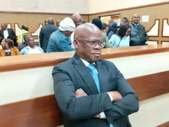 Mpumalanga taxi boss Joe "Ferrari" Sibanyoni leaves the Delmas Magistrate's Court on Thursday after being granted R70 000 bail alongside three co-accused on charges of extortion and two counts of money laundering, stemming from allegations that the group forced a Nkangala district businessman to hand over more than R2.2 million in protection fees between 2022 and 2025. Photo: Raymond Morare