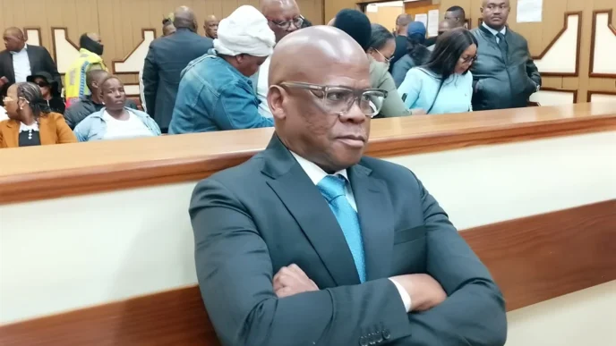 Mpumalanga taxi boss Joe "Ferrari" Sibanyoni leaves the Delmas Magistrate's Court on Thursday after being granted R70 000 bail alongside three co-accused on charges of extortion and two counts of money laundering, stemming from allegations that the group forced a Nkangala district businessman to hand over more than R2.2 million in protection fees between 2022 and 2025. Photo: Raymond Morare