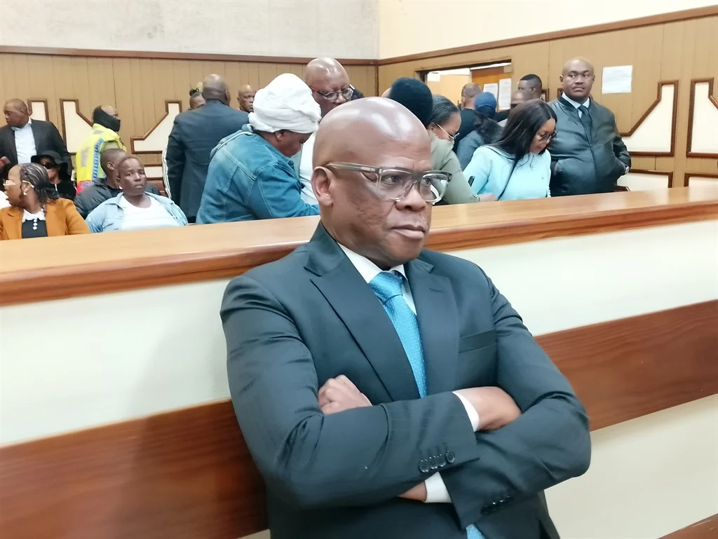 Mpumalanga taxi boss Joe "Ferrari" Sibanyoni leaves the Delmas Magistrate's Court on Thursday after being granted R70 000 bail alongside three co-accused on charges of extortion and two counts of money laundering, stemming from allegations that the group forced a Nkangala district businessman to hand over more than R2.2 million in protection fees between 2022 and 2025. Photo: Raymond Morare