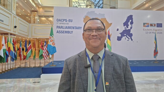 Hon. John Hoareau of Seychelles speaks with Swazi24 editor Adekunle Owolabi at the OACPS-EU Parliamentary Meetings in Eswatini.