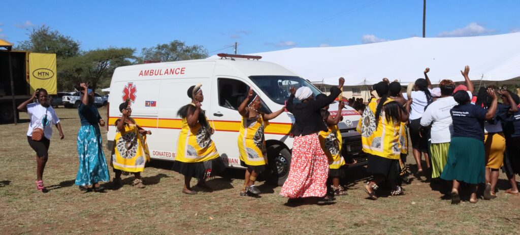 Community members from Lubulini Inkhundla erupt in celebration around the newly delivered ambulance during Saturday's handover ceremony, with the vehicle set to serve patients across several clinics in the constituency. | Photo: Ministry of Health Eswatini