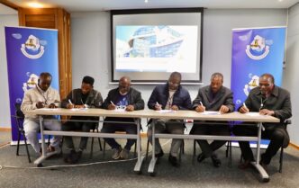 Officials from the Eswatini Water Services Corporation, kiosk operators, and Community Water Committee chairpersons of Zombodze Emuva pictured following the signing of a tripartite Memorandum of Understanding in the Shiselweni Region.