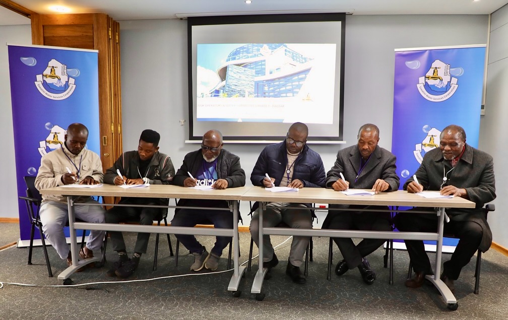 Officials from the Eswatini Water Services Corporation, kiosk operators, and Community Water Committee chairpersons of Zombodze Emuva pictured following the signing of a tripartite Memorandum of Understanding in the Shiselweni Region.