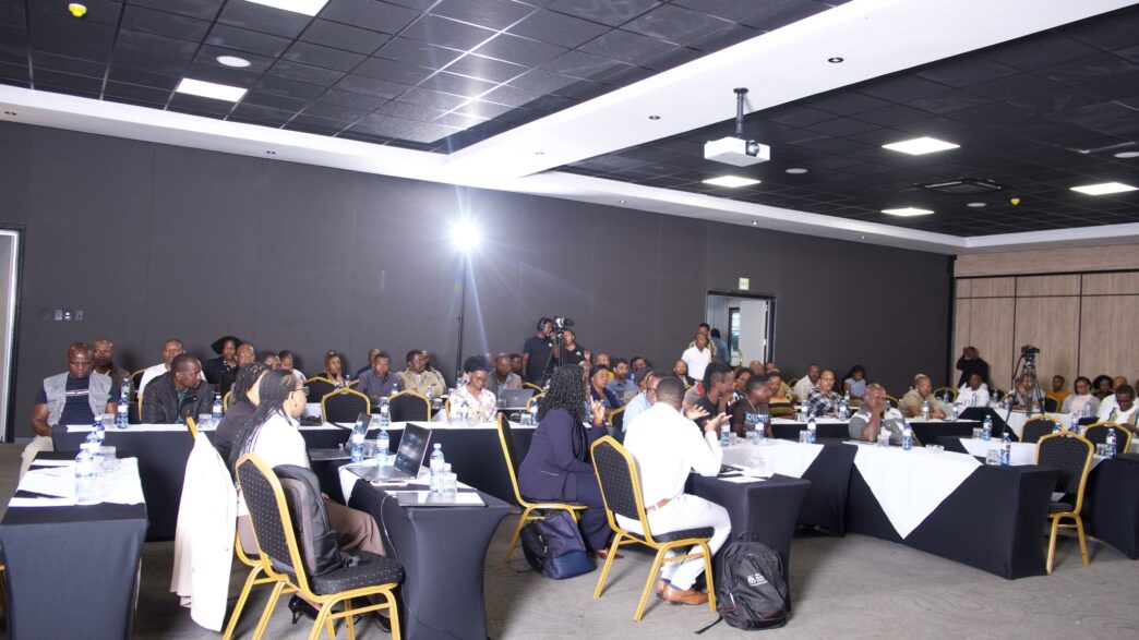 Participants follow proceedings during the IDCE Solar Indaba