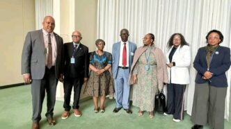 Lesotho's Minister of Labour and Employment Ts'eliso Mokhosi poses with delegates at the International Migration Review Forum in New York City. Photo: Lesotho News Agency
