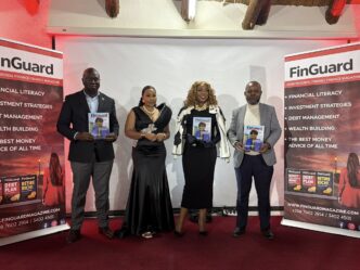 FinGuard Magazine founder Lungile Tsabedze pictured with ICT Minister Savannah Maziya and the Principal Secretary from the Ministry of Commerce, Industry and Trade during the launch of the financial publication on Friday evening. Photo: Ministry of Information, Communications and Technology