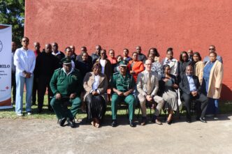 HMCS, European Union and Baphalali Eswatini Red Cross Society officials pose for a picture on the first day of the workshop on Monday. Photo by HMCS