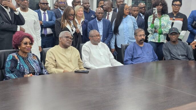 Caption Dangote Industries Limited President and Chief Executive Aliko Dangote and First HoldCo Group Chairman Olufemi Otedola pictured together during Otedola's visit to the Dangote Petroleum Refinery and Petrochemicals in Lagos, Nigeria, on Wednesday.
