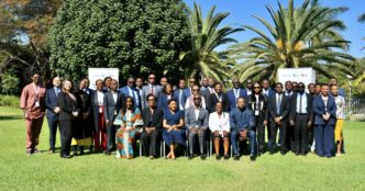 Zambia Revenue Authority Commissioner General Dingani Banda, Financial Intelligence Centre Director General Clement Kapalu, and representatives from the African Tax Administration Forum and Tax Justice Network Africa pose for a group photo. Photo by ZRA