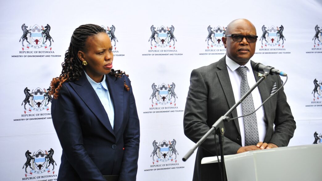 Minister of Environment and Tourism Wynter Boipuso Mmolotsi poses with newly appointed Permanent Secretary Abigail Khumoyame following the formal announcement of her substantive appointment at a staff meeting in Botswana