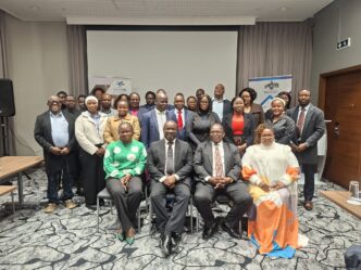 Ministry of Labour and Social Security Principal Secretary Makhosini Mndawe poses with stakeholders during the National Skills Training Levy Stakeholder Consultative Workshop held at the Hilton Garden Inn.