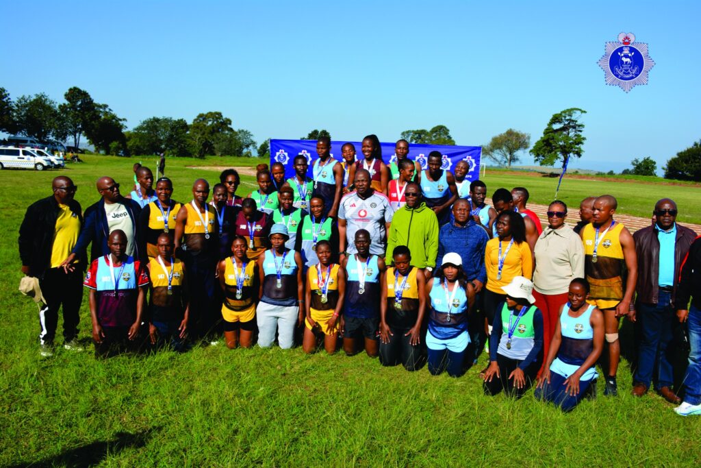 National Commissioner of Police Manoma Vusie Masango poses with athletes after the Royal Eswatini Police Service NATCOM's Games track and field events held at the Matsapha Police Academy. Photo: REPS