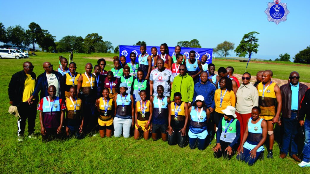 National Commissioner of Police Manoma Vusie Masango poses with athletes after the Royal Eswatini Police Service NATCOM's Games track and field events held at the Matsapha Police Academy. Photo: REPS