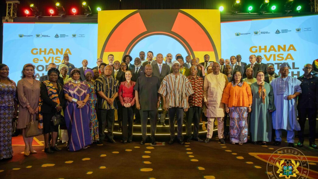 Ghanaian President John Dramani Mahama poses with government officials and stakeholders at the launch of Ghana's electronic visa portal, a move that scraps visa fees for all African passport holders visiting the country for business or tourism.