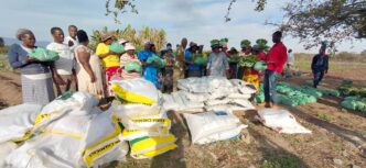 Deputy Prime Minister Thulisile Dladla, accompanied by MP Sabelo Ndlangamandla and NDRMA Chief Executive Officer Victor Mahlalela, poses with hailstorm-affected residents during a relief visit to Matsanjeni South. (Picture: Deputy Prime Minister's Office)