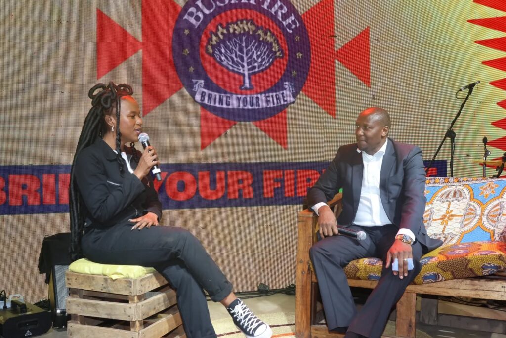 Prime Minister Russell Mmiso Dlamini speaks with festival host Phiwo Dhlamini at the MTN Bushfire Broadcast Corner during the 19th edition of the MTN Bushfire Festival in Malkerns. | Photo: Eswatini TV