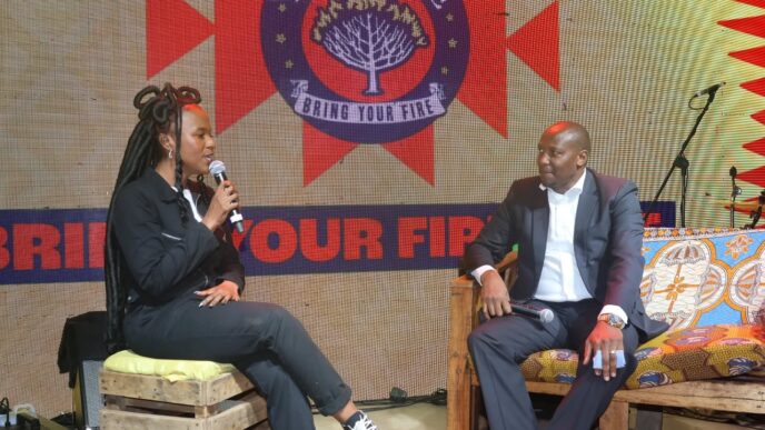 Prime Minister Russell Mmiso Dlamini speaks with festival host Phiwo Dhlamini at the MTN Bushfire Broadcast Corner during the 19th edition of the MTN Bushfire Festival in Malkerns. | Photo: Eswatini TV