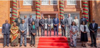 Zambian President Hakainde Hichilema poses for a group photo with newly appointed US chargé d'Affaires Mich Coker and their respective delegations during a courtesy call at State House in Lusaka on Wednesday, May 28, 2026.