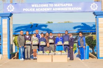 Some of the Royal Eswatini Police Service Athletics Club athletes pictured with their new Adidas running spikes, donated by retired athlete and coach Sergeant Sibusiso Matsenjwa, at the Matsapha Police Academy. Photo by REPS