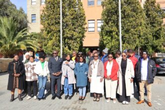 Journalists pose for a group photo with UNFPA Representative John Kennedy Mosoti, Director of Gender Ms. 'Mapuleng Secheche and other officials during a capacity-building workshop on gender-sensitive reporting convened by UNFPA in Lesotho. (Photo: UNFPA Lesotho)