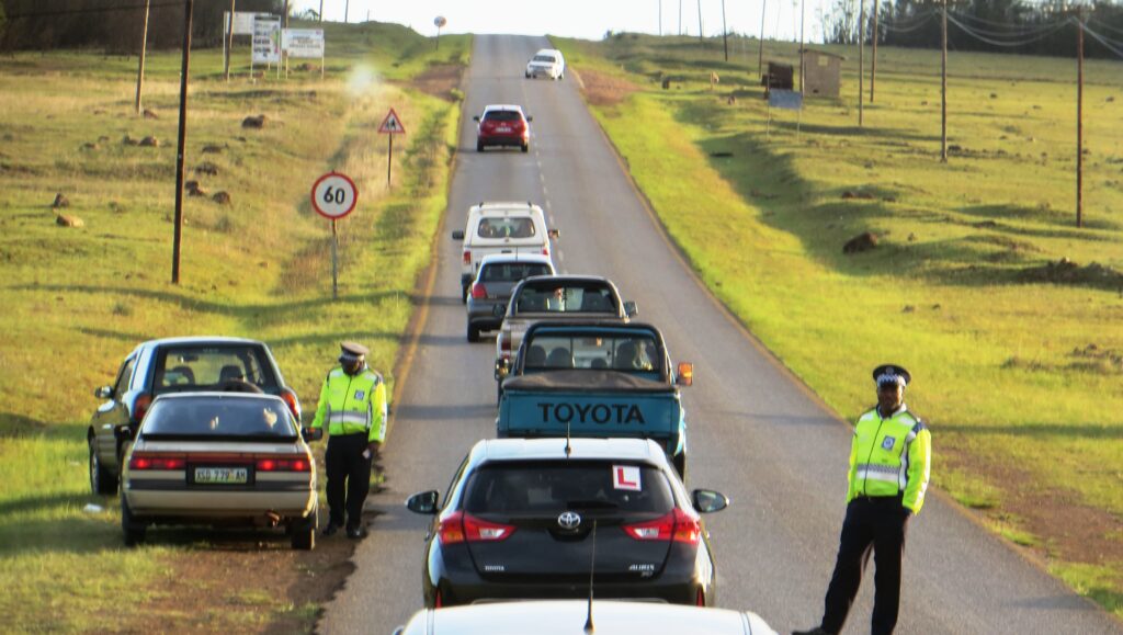Eswatini police officers staging a roadblock.