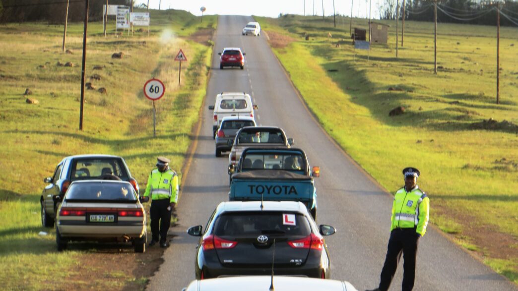 Eswatini police officers staging a roadblock.