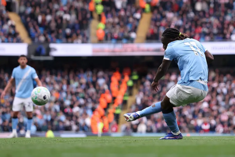 Jeremy Doku of Manchester City scores his team’s first goal [Naomi Baker/Getty Images]