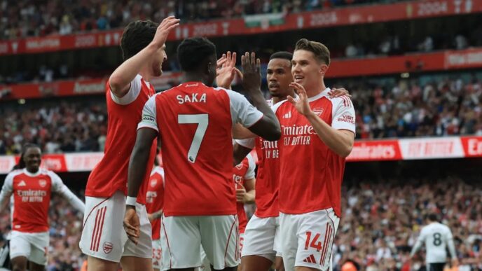 Arsenal striker Viktor Gyokeres celebrates with teammates after scoring one of his two goals during the Gunners' commanding 3-0 Premier League win over Fulham at the Emirates Stadium on Saturday,