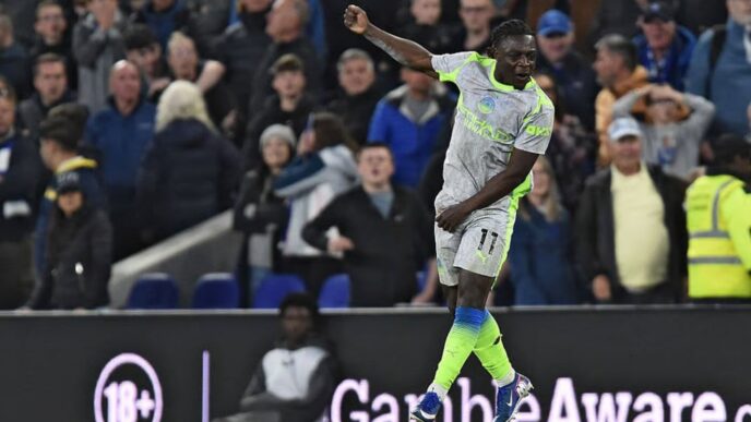 Manchester City winger Jeremy Doku celebrates after scoring his second goal of the night to earn City a 3-3 draw against Everton at Hill Dickinson Stadium in Liverpool. Photo by Getty Images