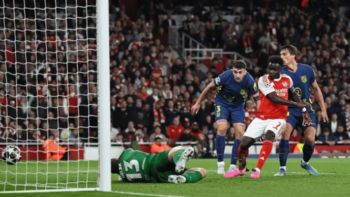 Bukayo Saka prods the rebound into the net on 44 minutes to send Arsenal into the UEFA Champions League final for the first time in 20 years