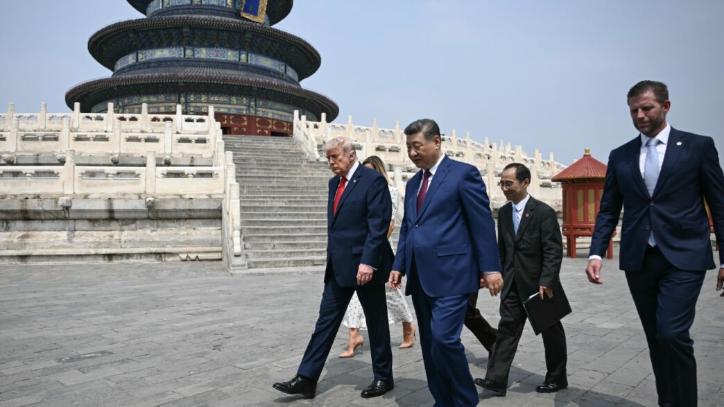 Trump and Xi Jinping walk together during the US-China summit in Beijing. | Brendan Smialowski/Pool/Getty Images Trump and Xi Jinping walk together during the US-China summit in Beijing. | Brendan Smialowski/Pool/Getty Images