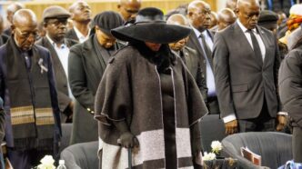 Boikaego Mogae, last born daughter of the late former Botswana President Festus Mogae, stands with distinguished guests during the memorial service held in honour of her father.