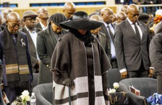 Boikaego Mogae, last born daughter of the late former Botswana President Festus Mogae, stands with distinguished guests during the memorial service held in honour of her father.