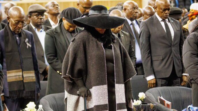 Boikaego Mogae, last born daughter of the late former Botswana President Festus Mogae, stands with distinguished guests during the memorial service held in honour of her father.